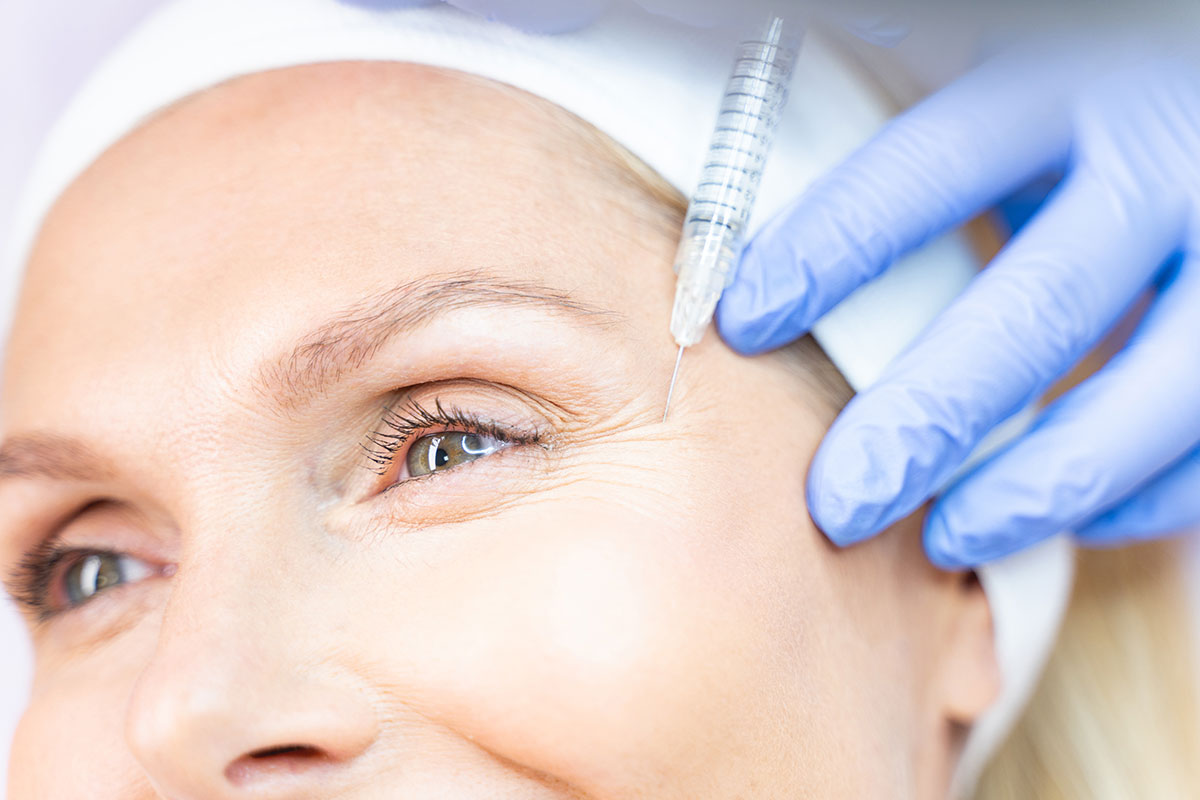 middle-aged-patient-smiling-during-the-cosmetic-pr-2026-01-08-06-33-13-utc